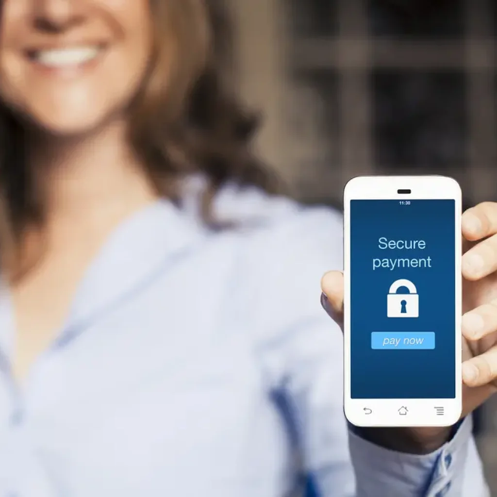 Woman showing security on her phone image - FAQ - smart cell direct